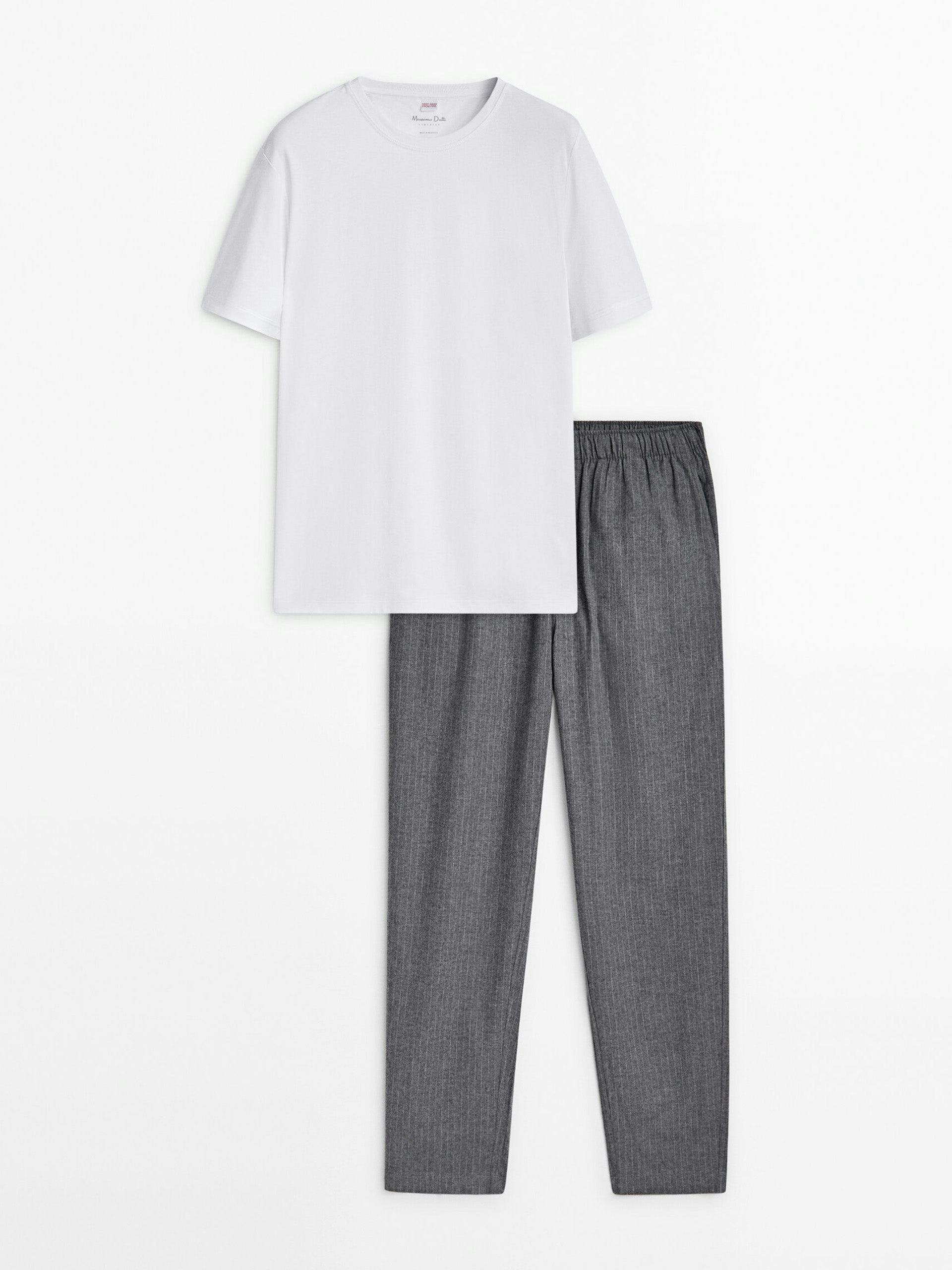 Striped pyjama bottoms and short sleeve t-shirt
