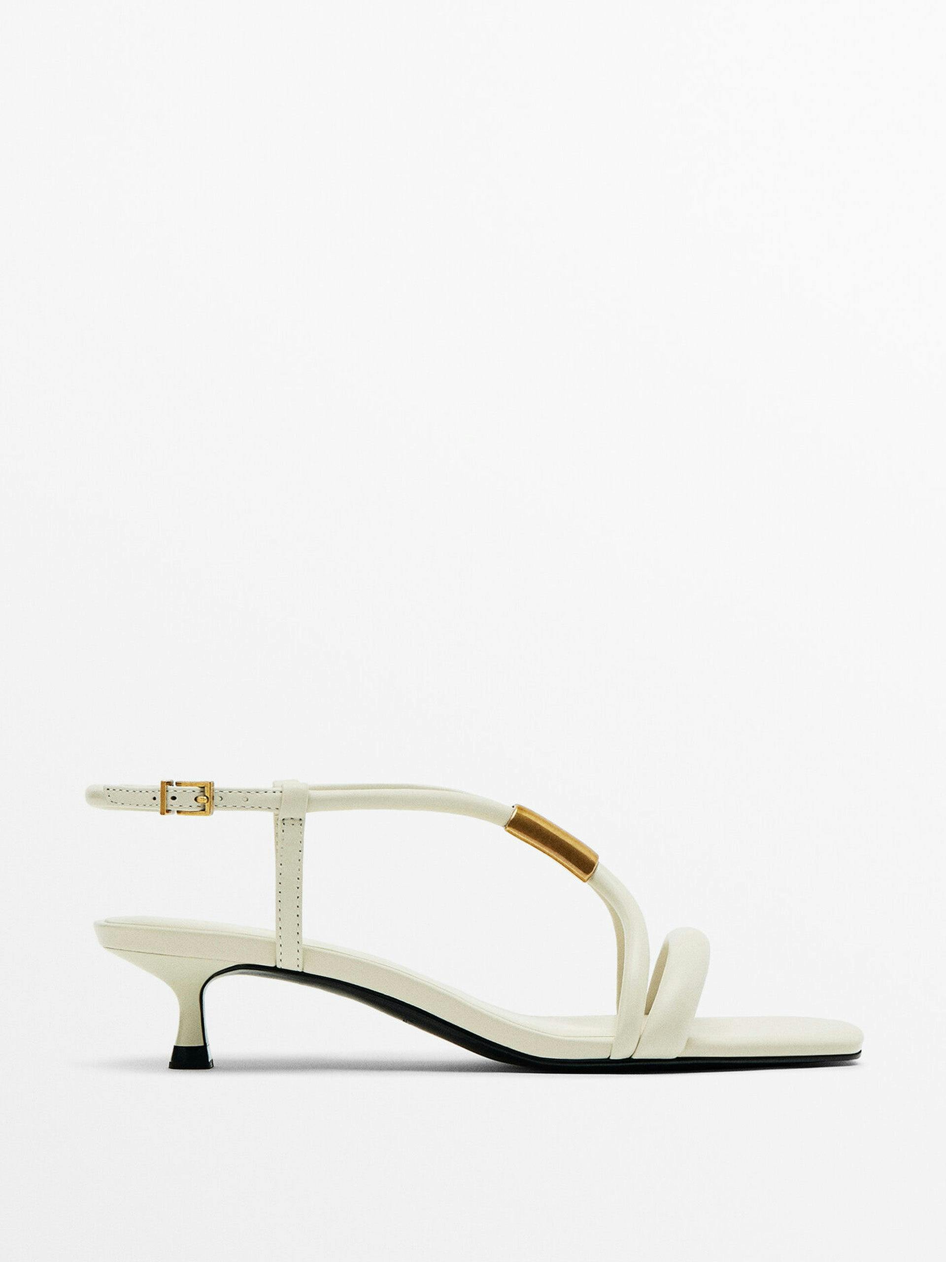High heel sandals with metal piece