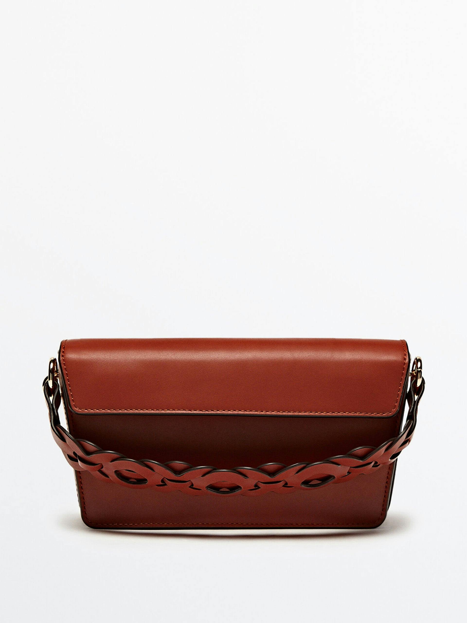 Leather crossbody bag with interwoven strap