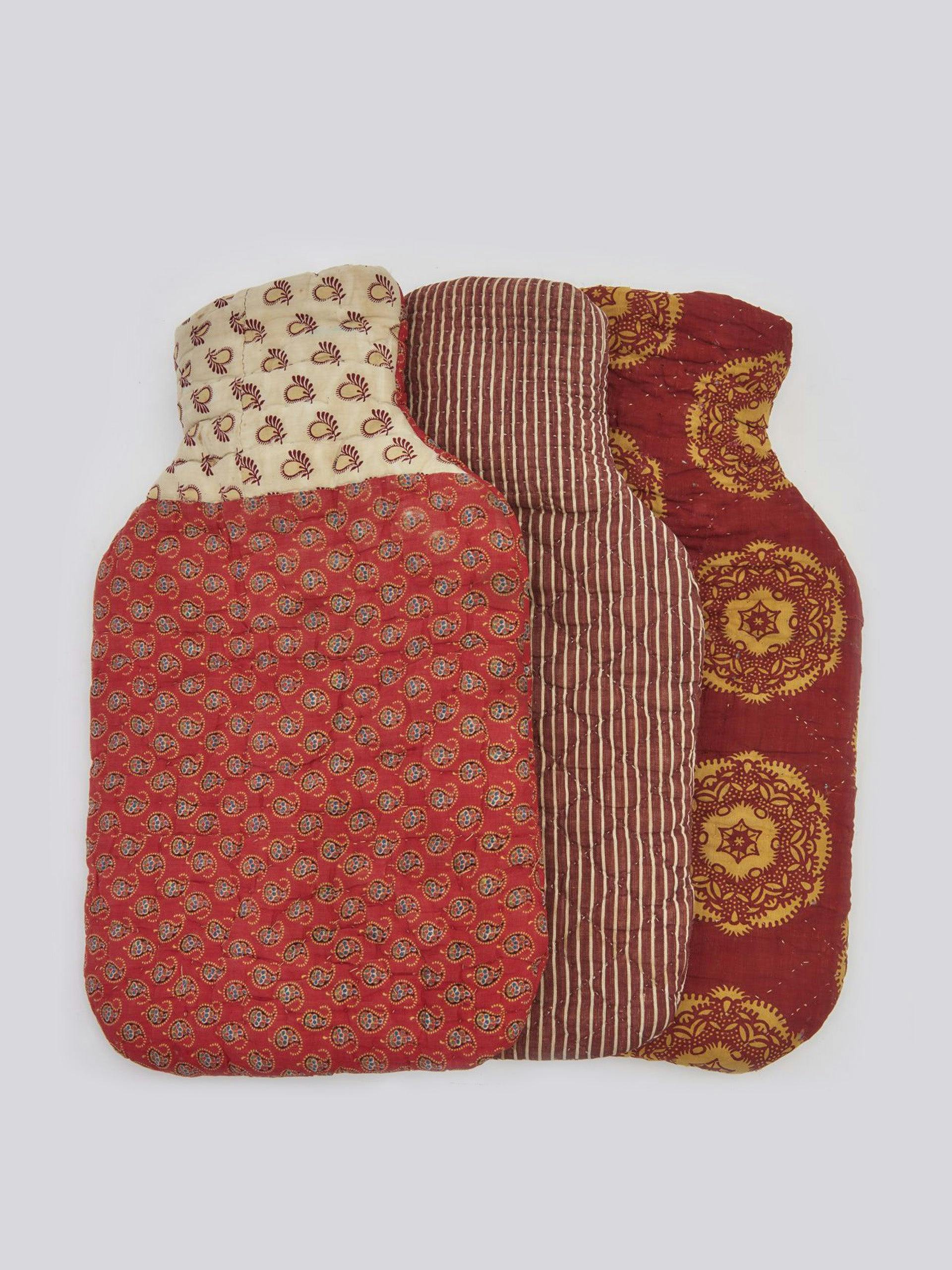 Hot water bottles with vintage fabric covers