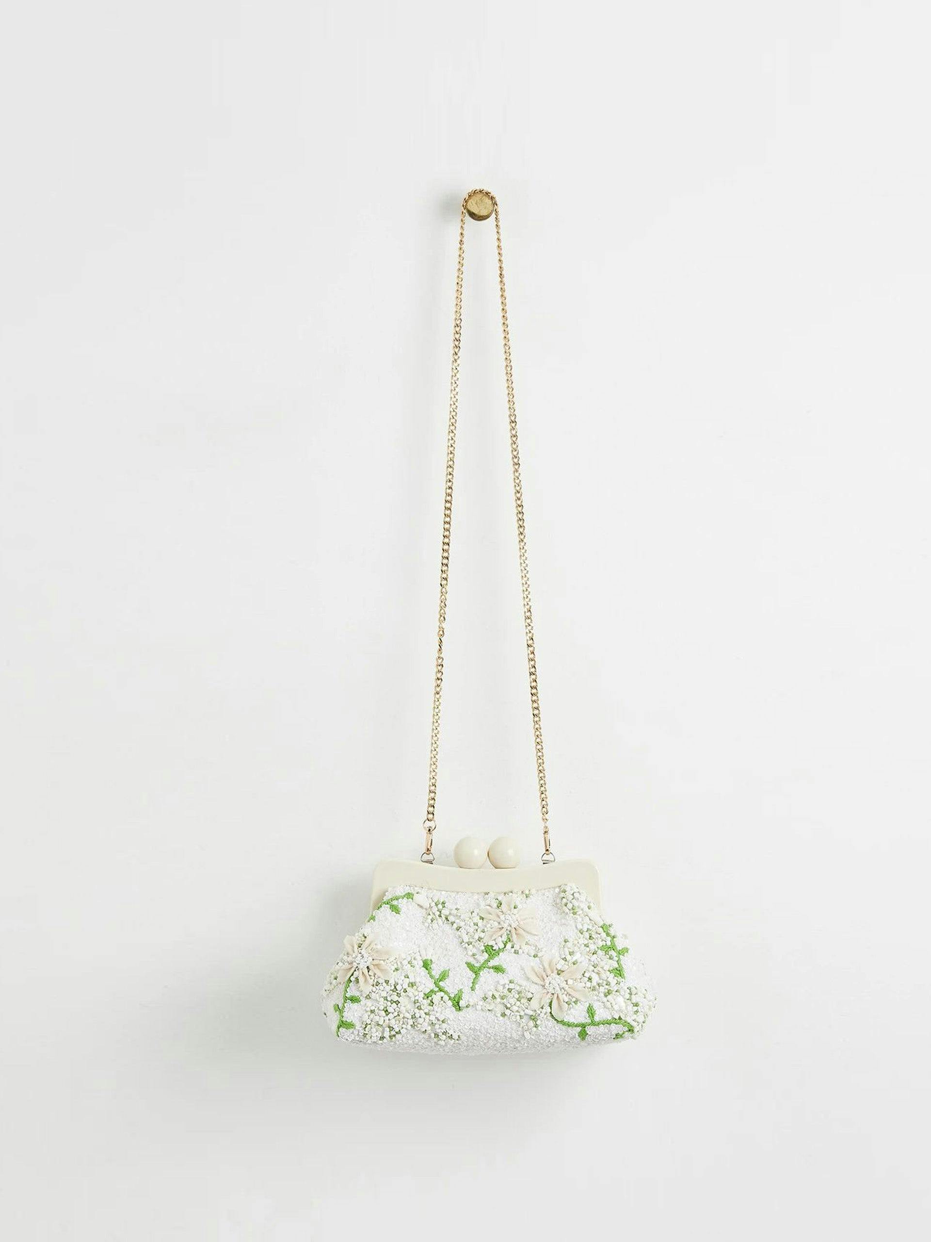 Via soft pearl floral white clutch bag