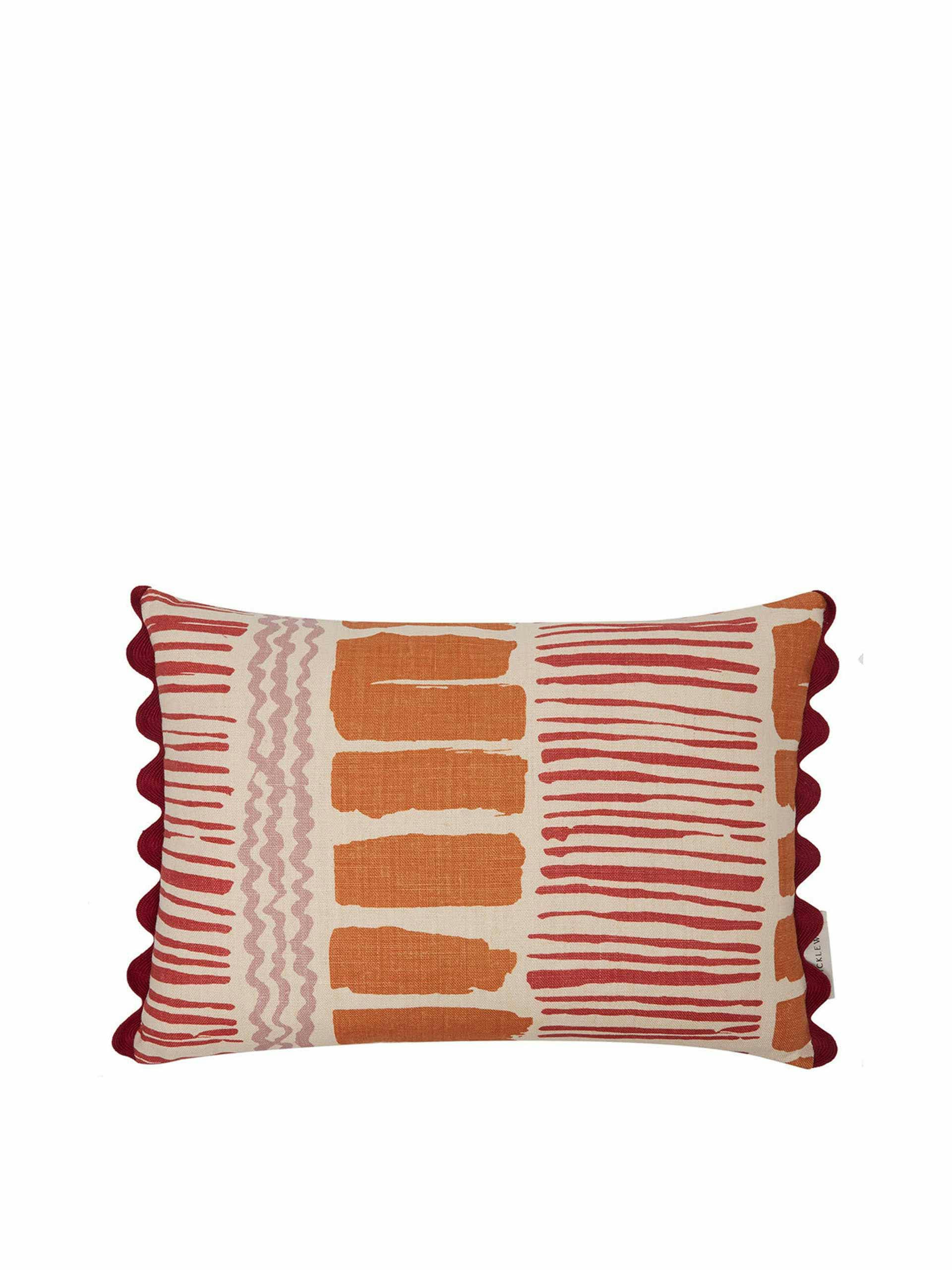 Saltaire orange red oblong cushion