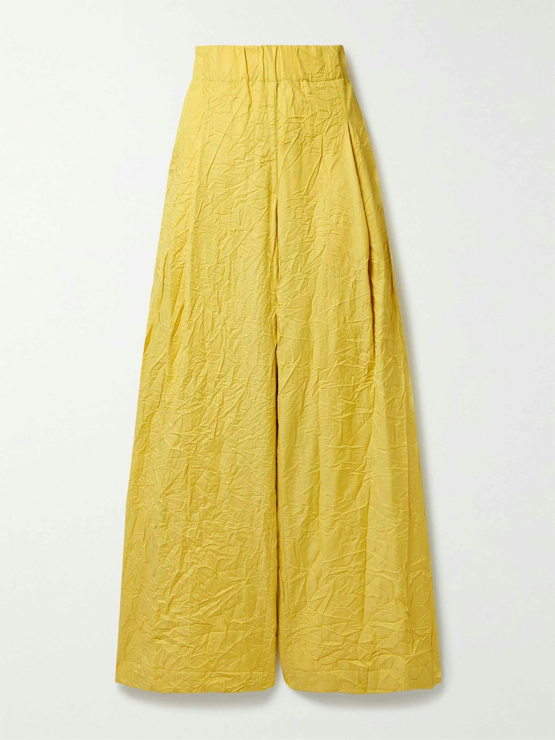 Yellow crinkled trousers