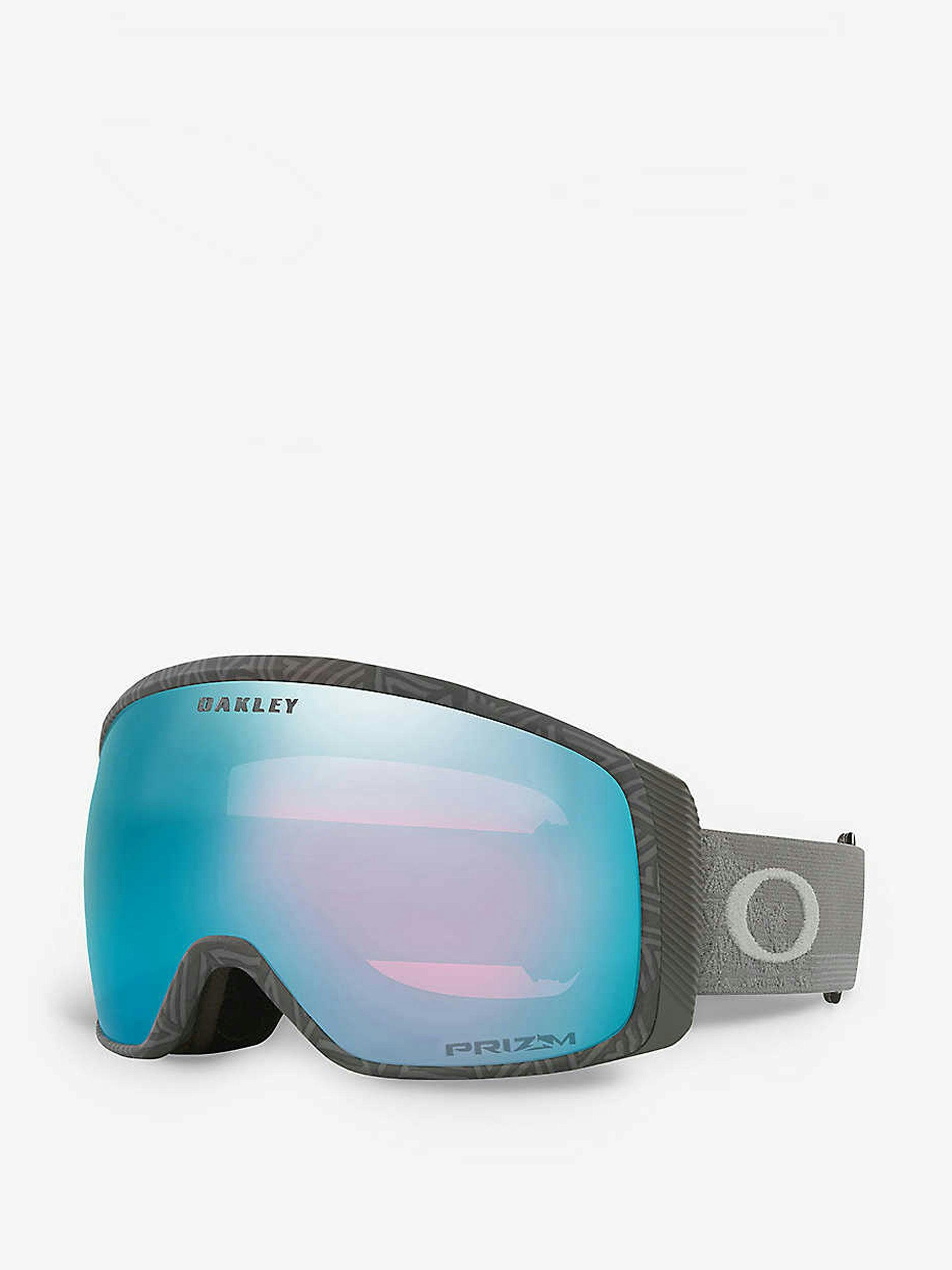 Blue and grey lensed ski goggles