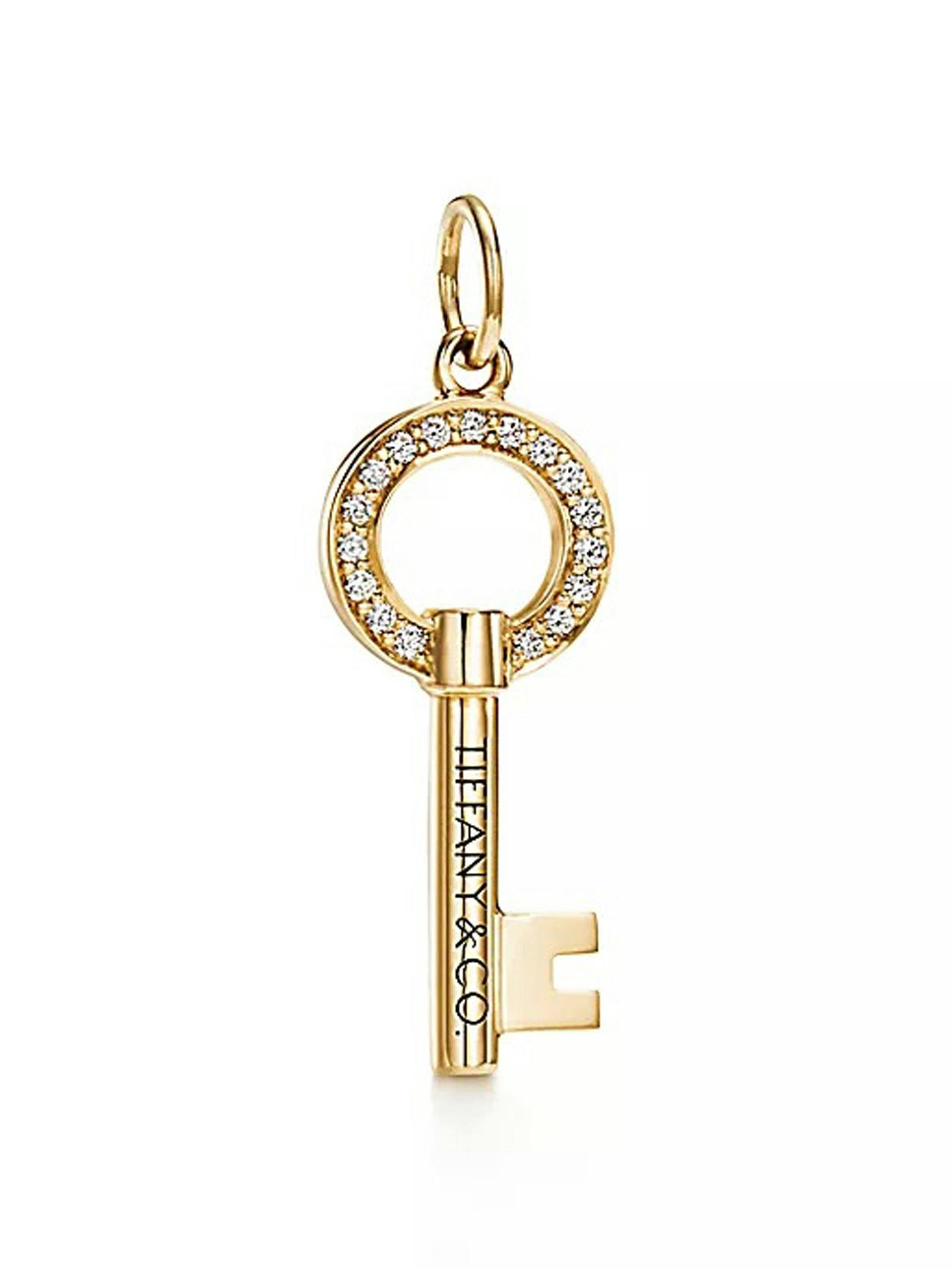 Gold open round key pendant